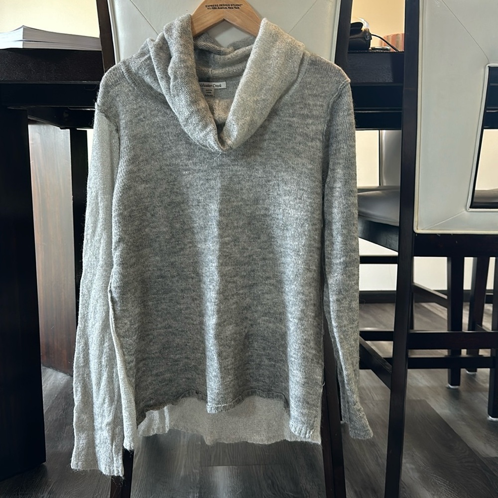 Women’s soft lightweight sweater with folder over turtleneck style. Worn once!